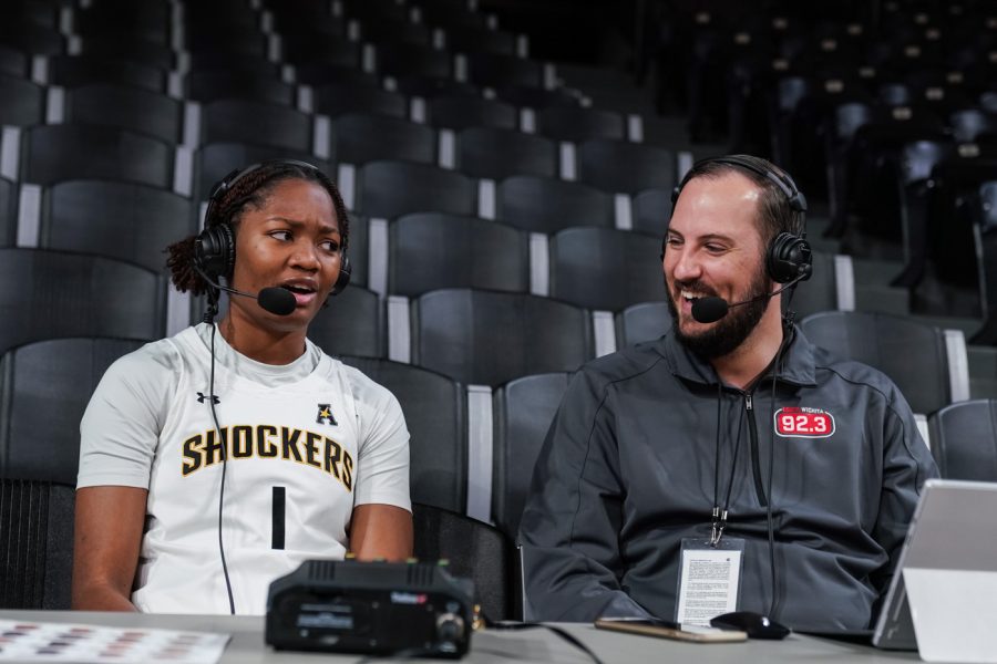 DJ McCarty gives an interview to the radio at Charles Koch Arena on Oct. 18.