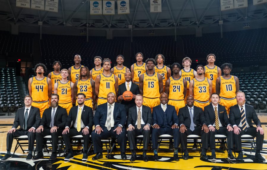 Mens Basketball team poses for a group photo at Charles Koch Arena on Oct. 18.