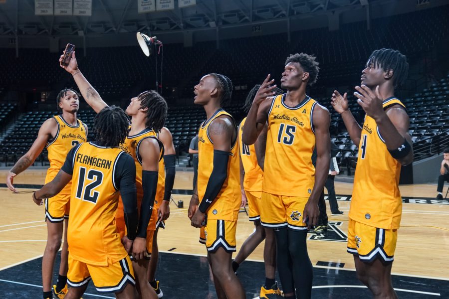 Mens Basketball team poses for a group selfie at Charles Koch Arena on Oct. 18.