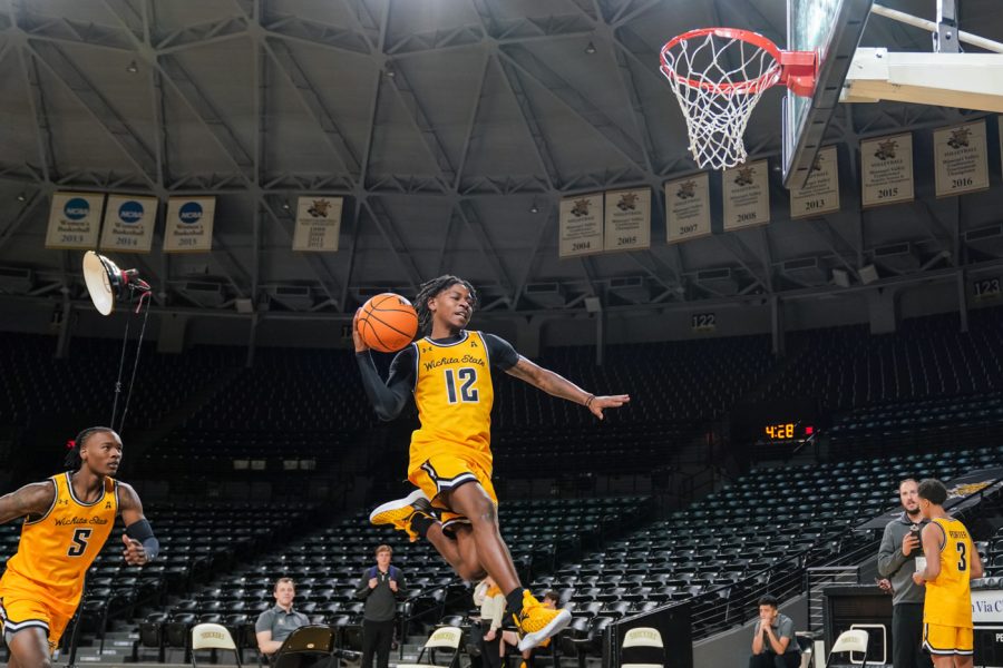 Sophomore Melvion Flanagan drives with the ball at Charles Koch Arena on Oct. 18.