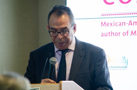 Journalist Alfredo Corchado reads an exerpt from his book Midnights in Mexico. On Oct. 25, Corchado read an exerpt of his book detailing the dangers he went through reporting events near the border.
