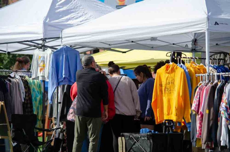 Locals shop at vendors during Shop and Grub. People gathered at Naftzger Park on Sunday to shop small businesses.