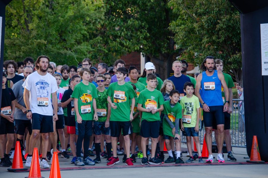 Contestants line up in preparation for the race. Participants of all ages waited eagerly for the 5k race to begin.