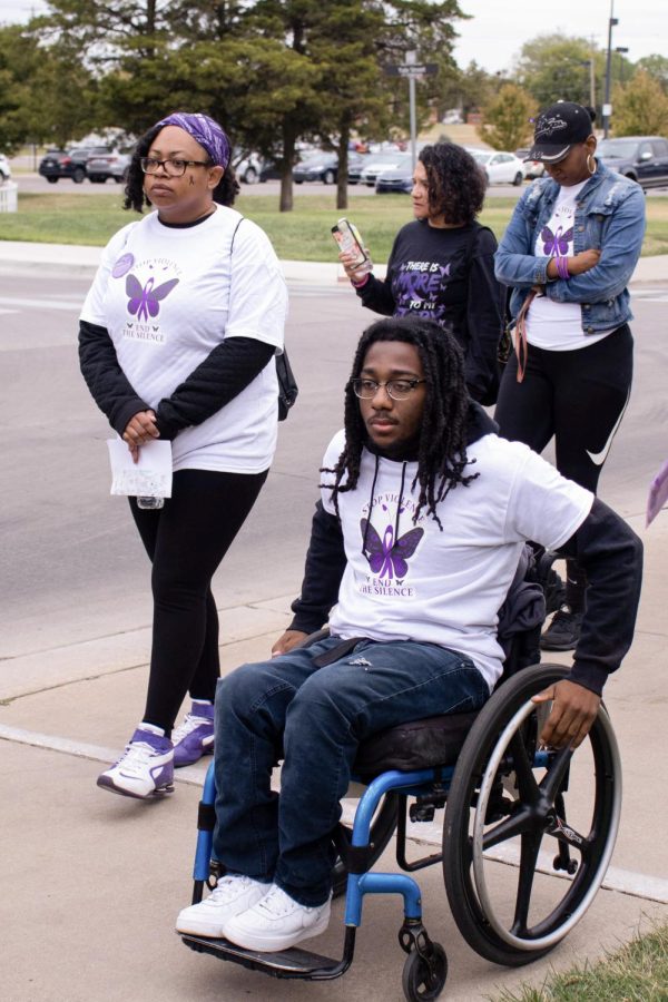 Purple Mile participants walk in solidarity for those who have been impacted or lost their lives to domestic violence. Many attendees wore purple ribbons, the trademark symbol for domestic violence awareness.