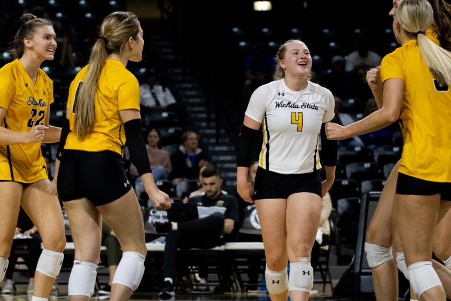 The Shockers celebrate a set point against Tulsa on Oct. 12 at Charles Koch Arena.