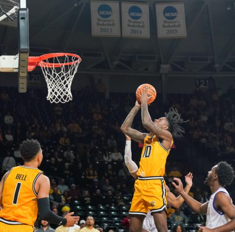 Junior guard Jaykwon Walton shoots the ball in the paint against Alcorn State at Charles Koch Arena on Nov. 12.