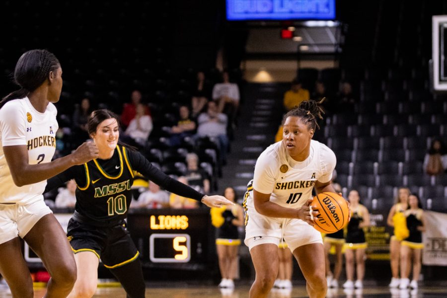 Graduate+student+Curtessia+Dean+tries+to+pass+the+ball+to+her+teammates+during+the+game+against+Missouri+Southern+on+Nov.+1+at+Charles+Koch+Arena.+Dean+had+a+season-high+with+nine+rebounds%2C+three+assists+and+a+steal+at+Crieghton+on+Jan.+14+with+Seton+Hall.