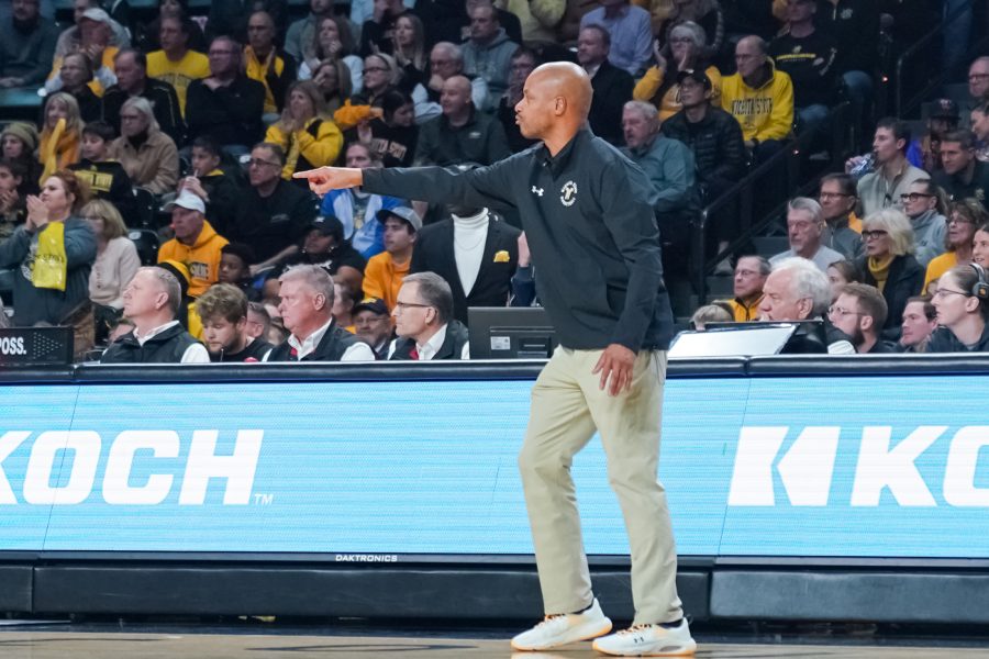 Head coach Isaac Brown instructs his team on the court on Nov. 29 inside Charles Koch Arena. The Shockers lost the game against Mizzou 88-84 in overtime. 