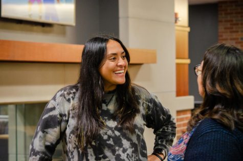 Natanya Ordonez, President of the First Generation Student Organization, converses with Lydia Santiago, First Generation Student Organization Co-Advisor. On Nov 10, the First Generation Student Organization hosted a first-gen mingle for first generation college students to connect.
