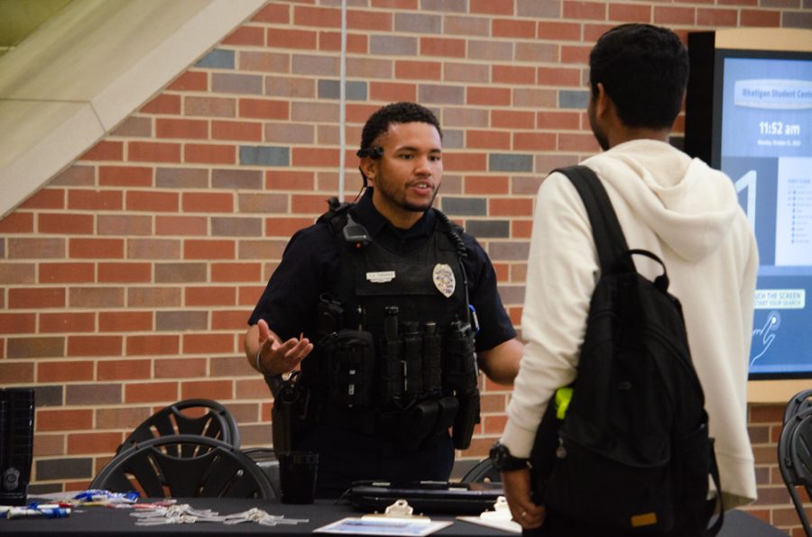 Officer Thomas of the Wichita Police Department engages in conversation with a student. On Oct. 31, the WSUPD hosted Coffee with a Cop to encourage students to interact with their local law enforcement.