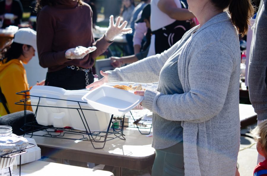 People gather on campus at the annual Interfest event. On Nov. 2, as a part of SGAs diversity week, different groups and organizations shared their traditional, cultural food.