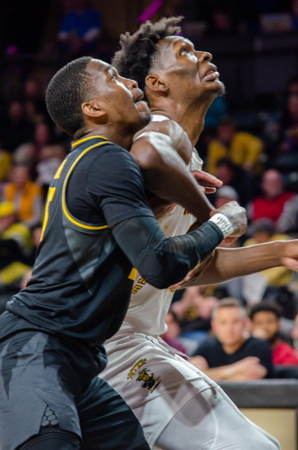 Wichita States center Quincy Ballard (right) guards Univerisity of Missouri player DMoi Hodge (left). On Nov 29., mens basketball played the University of Missouri at Wichita State. Mizzou won 88-84 in overtime.