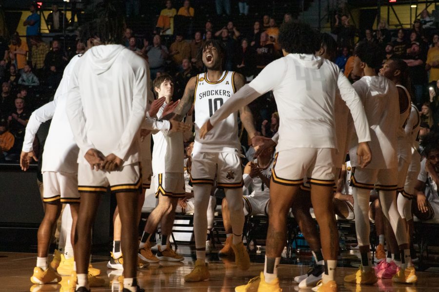 Junior guard Jaykon Walton yells after being announced for the starting line up before the game against Tarleton State. The Shockers won, 83-71.