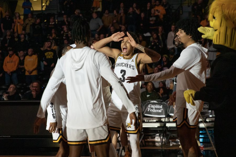 Senior guard Craig Porter Jr. yells after being announced for the starting line up before the game against Tarleton State. The Shockers won, 83-71.