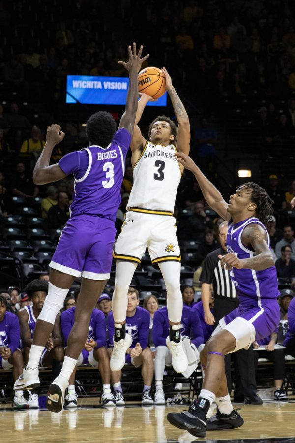 Senior guard Craig Porter Jr. goes up for a two pointer during the game against the Texans on Nov. 26. The Shockers won, 83-71.