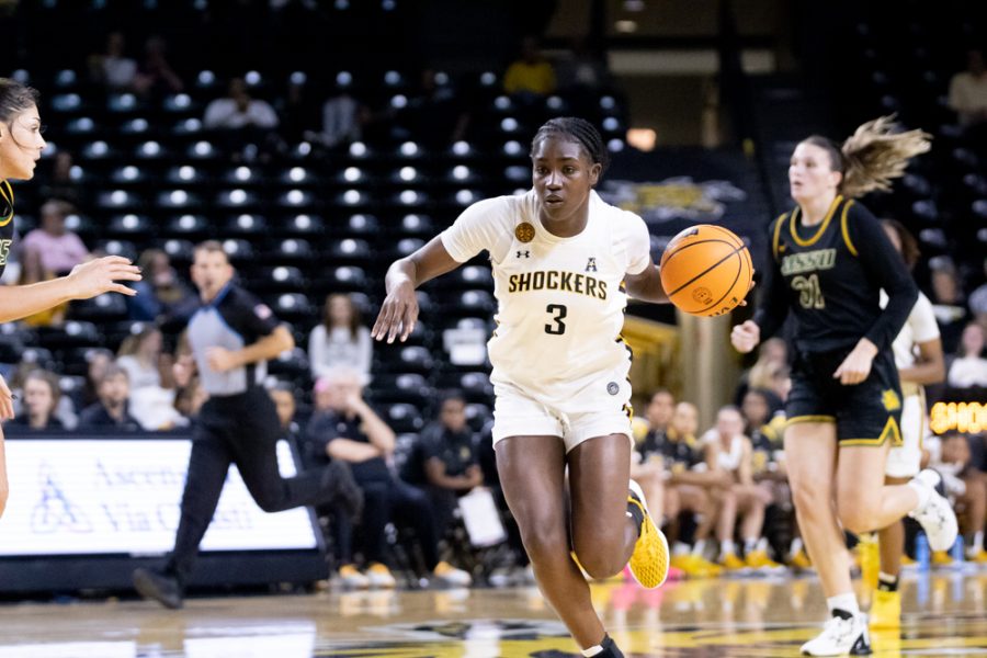 Sophomore+Ornella+Niankan+dribbles+down+the+court+during+the+game+against+Missouri+Southern+on+Nov.+1+at+Charles+Koch+Arena.+Niankan+played+in+her+first+game+as+a+Shocker+in+the+womens+team+72-70+win+in+overtime.+