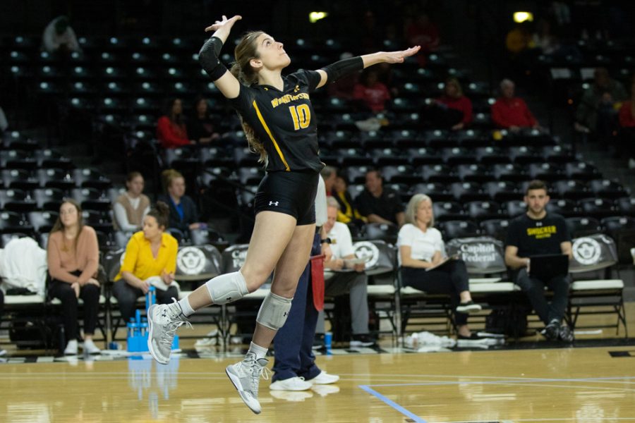 Sophomore libero Annalie Heliste serves the ball in set two against Houston on Nov. 13 in Charles Koch Arena. Heliste recorded 12 digs in  three sets.