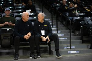 Bob Hull (left) and Mike Kennedy (right)  watches the Wichita State Basketball teams participate in Shocker Madness on Oct. 27 in Charles Koch Arena. Kennedy has been the Voice of the Shockers for over 40 years. Hull has worked with Kennedy for several years on the road as a color brodcaster. 