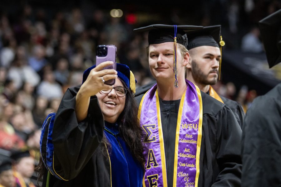 Graduates take a picture together during the Fall 2022 Commencement ceremony on Dec. 18.