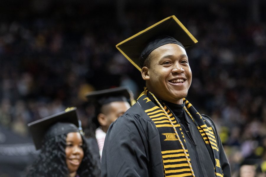 A graduate laughs during the Fall 2022 Commencement ceremony on Dec. 18.