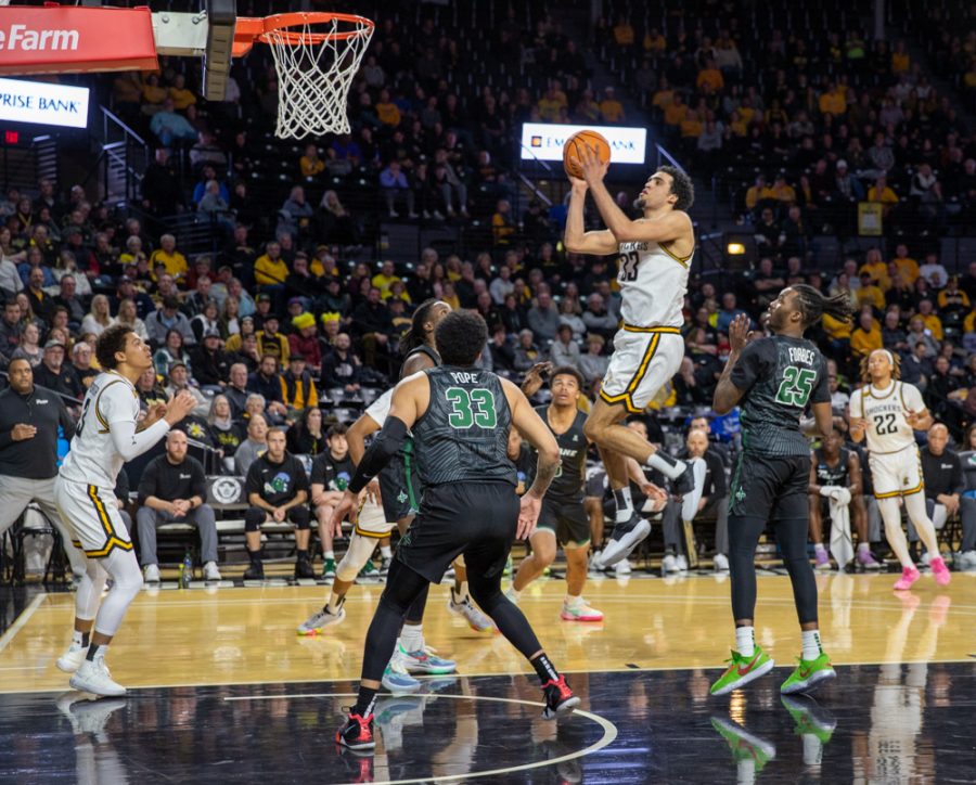 Senior forward James Rojas goes for a layup in the first half of the WSU vs Tulane game on January 25, 2023. The game went to overtime with a final score of 90-95.