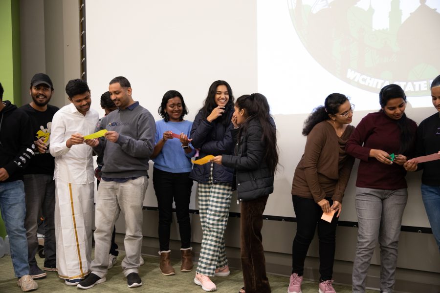Students laugh at the prompts the receive for an icebreaker. The Indian Student Association hosted games at the freshers part on Jan. 27.