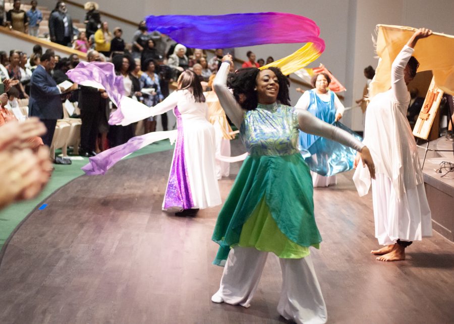 Praise dancers of the Greater Wichita Ministerial League dance  and sing before the start of the 2023 MLK Celebration inside the WSU Metroplex. The event brought Roland Martin, a journalist, to speak about Martin Luther King.