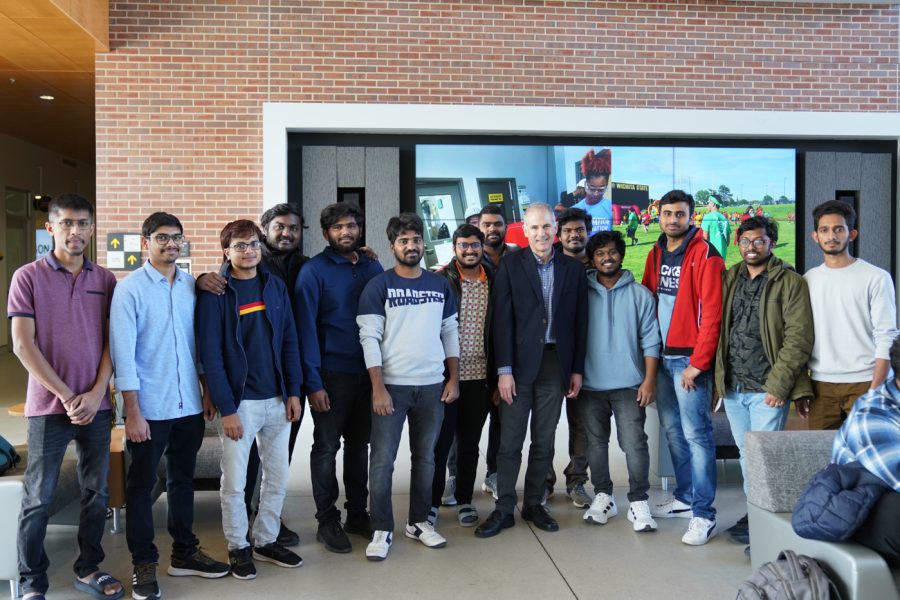 Students stand next to Anthony Muscat, Dean of the College of Engineering, during Engineering Week at the John Bardo Center on Feb. 20.