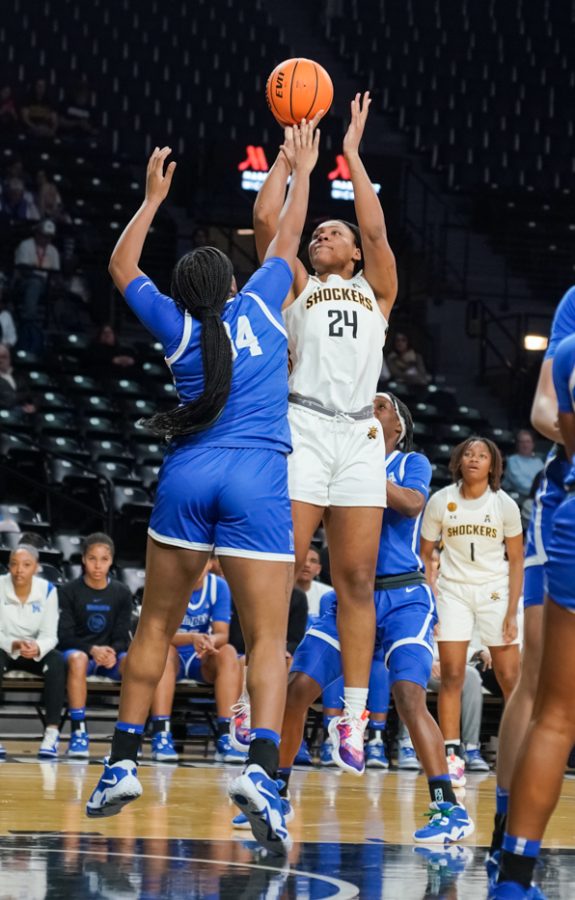 Senior forward Trajata Colbert shoots a jumper over a Memphis defender. Colbert scored 11 points and grabbed 10 rebounds, making it her fifth double-double of the season.