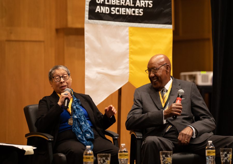 Elvira Valenzuela Crocker and Louis Sturns laugh at jokes they both made while speaking on a panel. Crocker and Sturns were inducted into the Fairmount College Hall of Fame on Feb. 7.