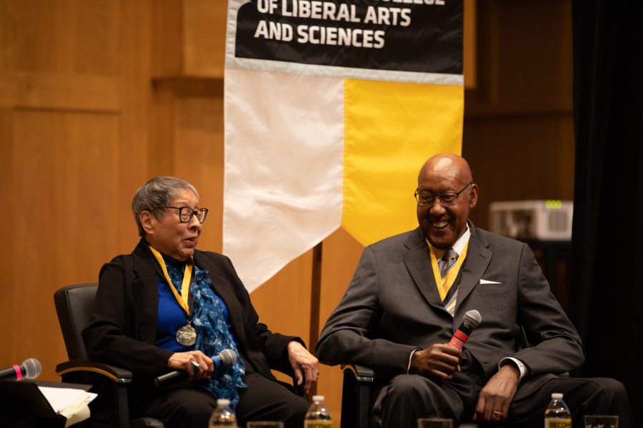 Elvira Valenzuela Crocker and Louis Sturns laugh at jokes they both made while speaking on a panel. Crocker and Sturns were inducted into the Fairmount College Hall of Fame on Feb. 7.