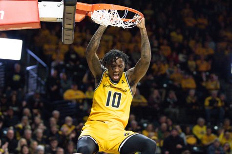 Junior Jaykwon Walton dunks the ball against Houston during Thursday nights game on Feb. 2 at Charles Koch Arena. Walton scored 24 points in their loss to the Cougars.
