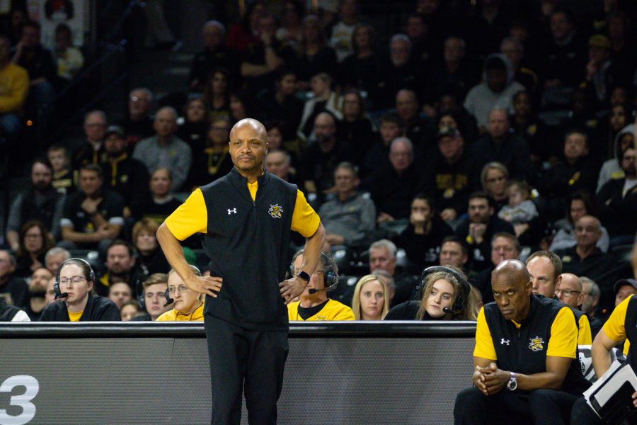 Coach Issac Brown watches the game on Feb. 2 against the Houston Cougars at Charles Koch Arena. The Shockers lost the game 70-61 against Houston.
