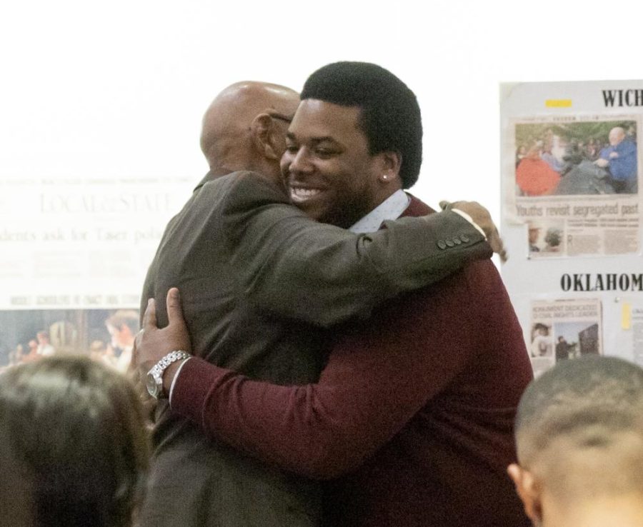 Galyn Vesey, a lifelong Wichita native and civil rights activist, hugs Gregory Vandyke Jr., the Speaker of the Senate in SGA, at the 15th annual MLK Commemoration on Jan. 31. Vandyke read an excerpt of Martin Luther King Jr.s I Have a Dream speech, before Vesey gave his keynote speech.
