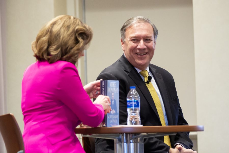 Elizabeth King, president and CEO of the WSU Foundation and Alumni Engagement, speaks to Mike Pompeo, former secretary of state and CIA director, about his new book Never Give an Inch at Wichita State on Feb. 10.