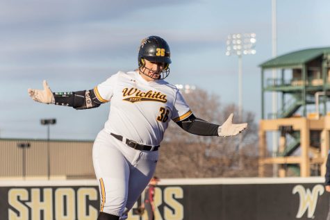 Senior Lauren Mills runs past all the bases as she returns home after hitting it out of the park. This brings Mills to 6 season home runs, and 39 career home runs.