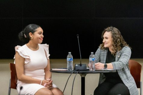 Student Body President Iris Okere and Vice President Sophie Martins talk during the presidential debate on March 23. Following their inauguration, the pair spoke with The Sunflower about how their campaign goals will manifest during the session.