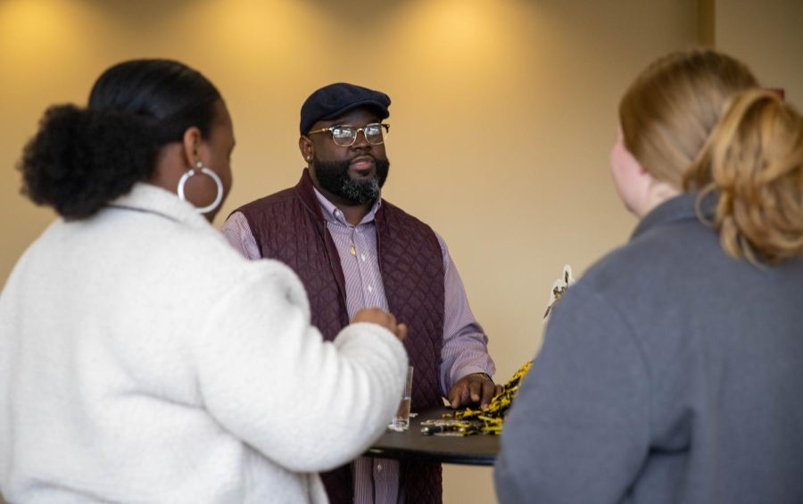 Graduate assistant Michaela Roper and student assistant Kyndal Dorzweiler meet Harold Wallace III, the new director of the Office of Diversity and Inclusion. The meet and greet took place on March 1.