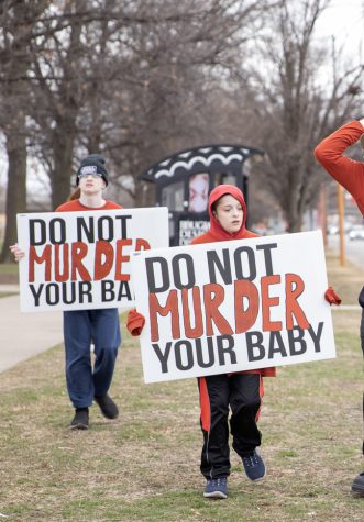 Children march in downtown Wichita on March 2 during an anti-abortion rally. The march was a part of a series of weeklong events.