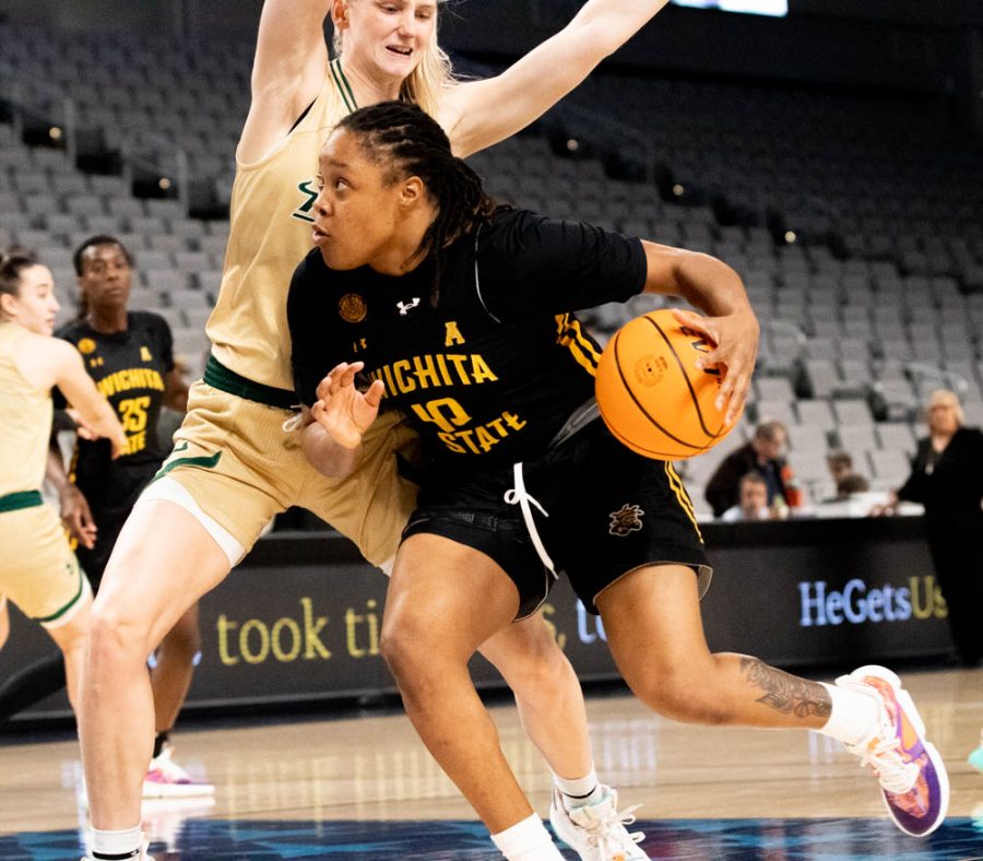Garduate student Curtessia Dean goes in to shoot the ball against South Florida on March 7 at Dickies Arena. Dean scored 14 points against the Bulls.