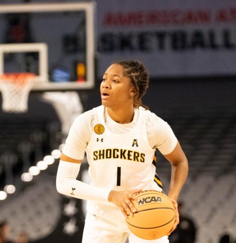 Junior Dj McCarty looks to her teammates for pass during the game against Temple at The AAC tournament in Dickies Arena at Fort Worh on March 6, 2023 McCarty made 18 points of the winning 71 points. The girls will play again on Tuesday at 12:00 against South Florida.
