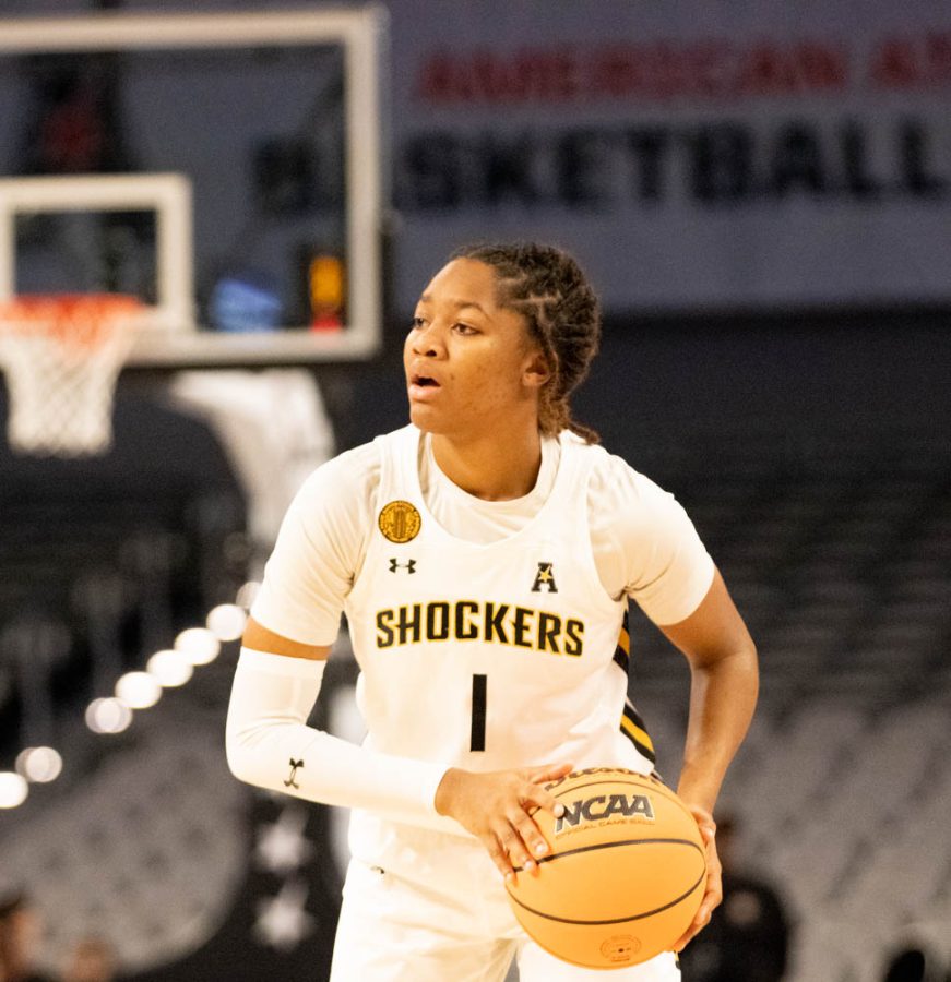 Junior+Dj+McCarty+looks+to+her+teammates+for+pass+during+the+game+against+Temple+at+The+AAC+tournament+in+Dickies+Arena+at+Fort+Worh+on+March+6%2C+2023+McCarty+made+18+points+of+the+winning+71+points.+The+girls+will+play+again+on+Tuesday+at+12%3A00+against+South+Florida.