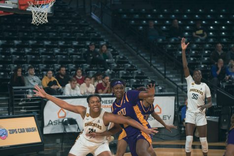 Senior forwards Trajata Colbert and Jane Asinde fight for position in the post. Wichita State lost to East Carolina on Jan. 21 in Charles Koch Arena 66-57.
