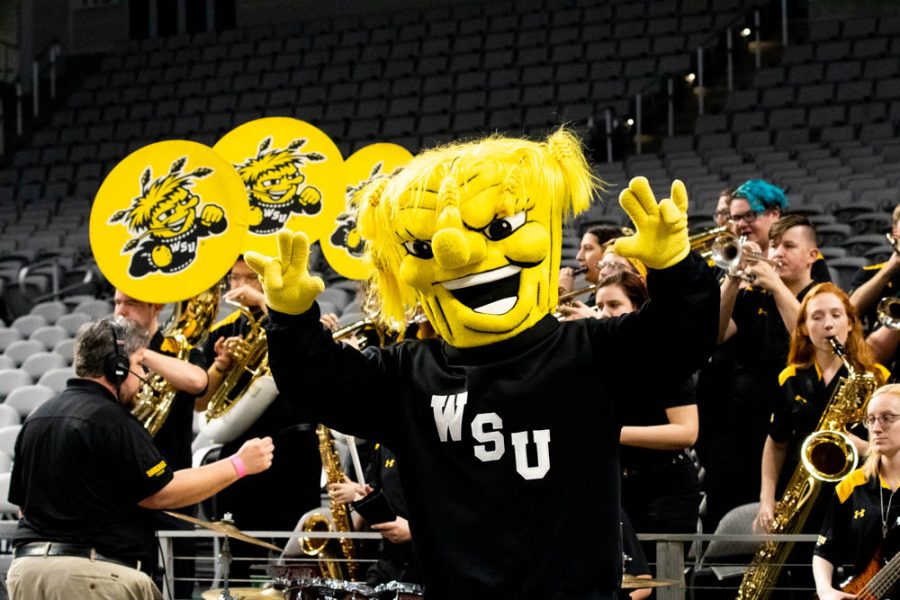 Wu and the Shocker band hype fans up during the womens game against the USF Bulls at the conference tournament on March 7.