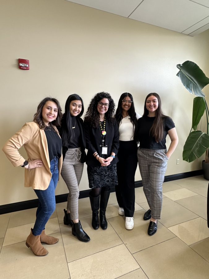Kariana Massingill, Donna Tran, Leandra Hernandez, Valeria Paunetto and Magaly Castillo pose for a photo at the gender and sexuality conference on March 10.