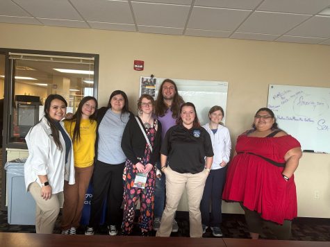People interested in joining the Indigenous Student Collective pose for a photo.
