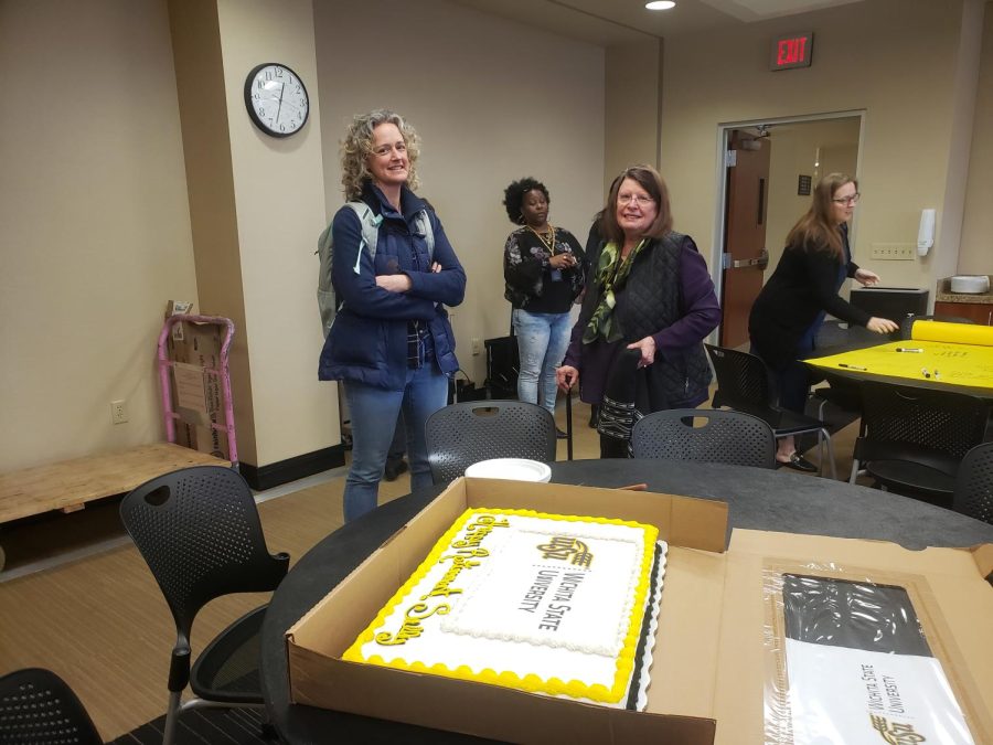 Sally Jones (right) at her retirement party on March 24, 2023. Jones retired that year after 43 years as the Intensive English director.