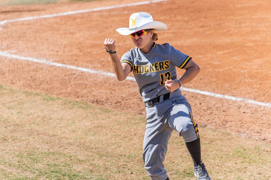 Madyson Espinosa dances on the field after a teammate hit a grand slam in a Wichita State game from April 2023.