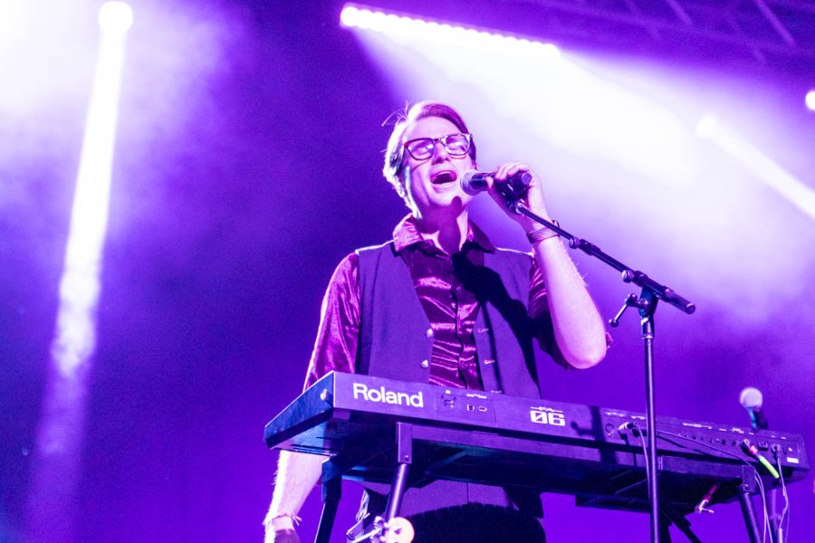 AJ Jackson, lead vocalist and pianist for Saint Motel, sings during their third song Friday. On Friday April 14, Saint Motel was the main act for a concert hosted by SAC at Koch Arena.