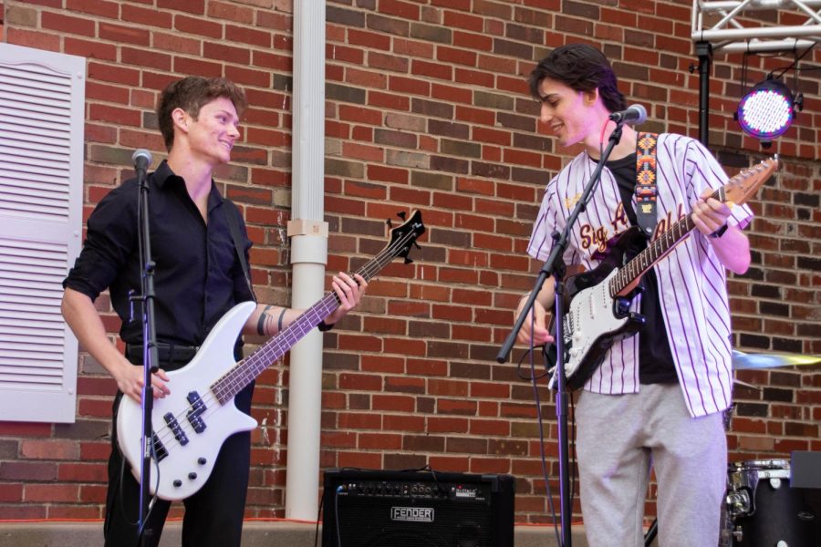 Sigma Alpa Epsilon members Zach Gordon and Brennan Pavey come together with their bandmates to perform at Paddypalooza on April 24.